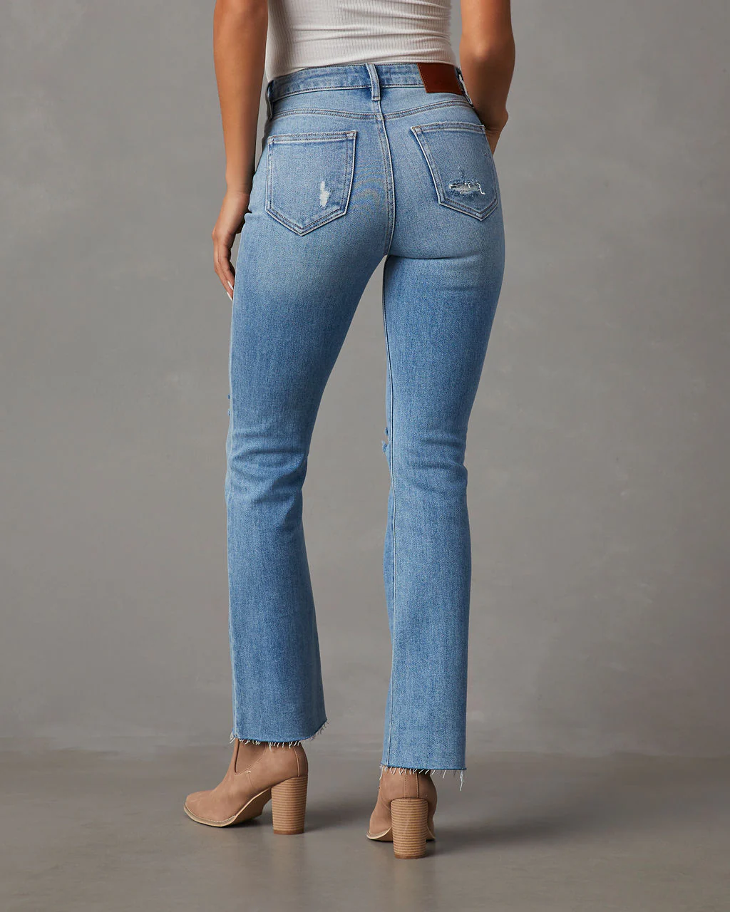 10213-auggie-super-stretch-high-rise-distressed-flare-jeans-1.webp