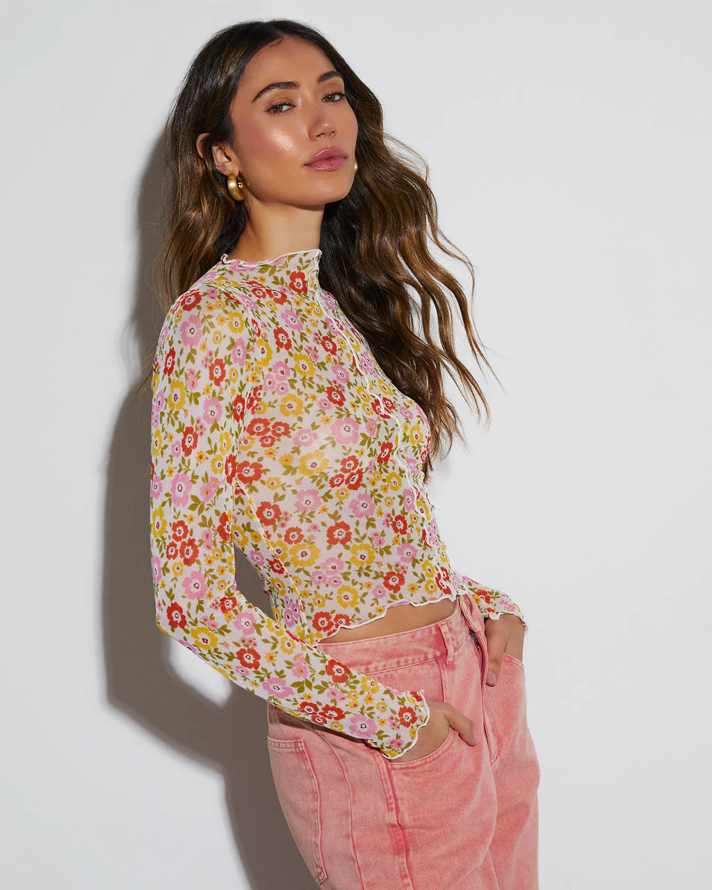 11122-feeling-good-sheer-floral-lettuce-hem-top-1.webp
