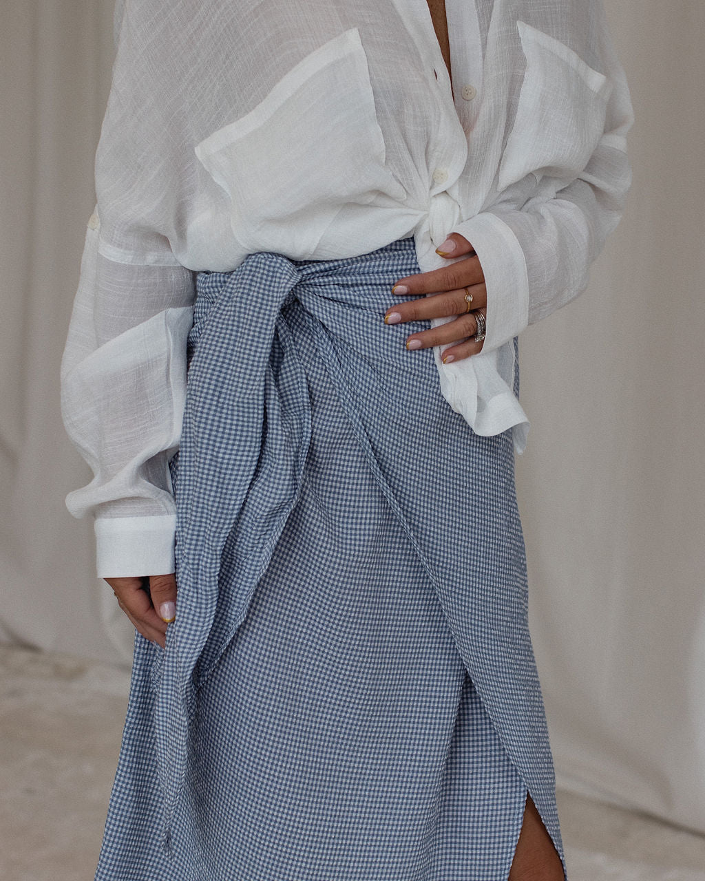 12257-amelie-gingham-side-tie-midi-skirt-1.webp