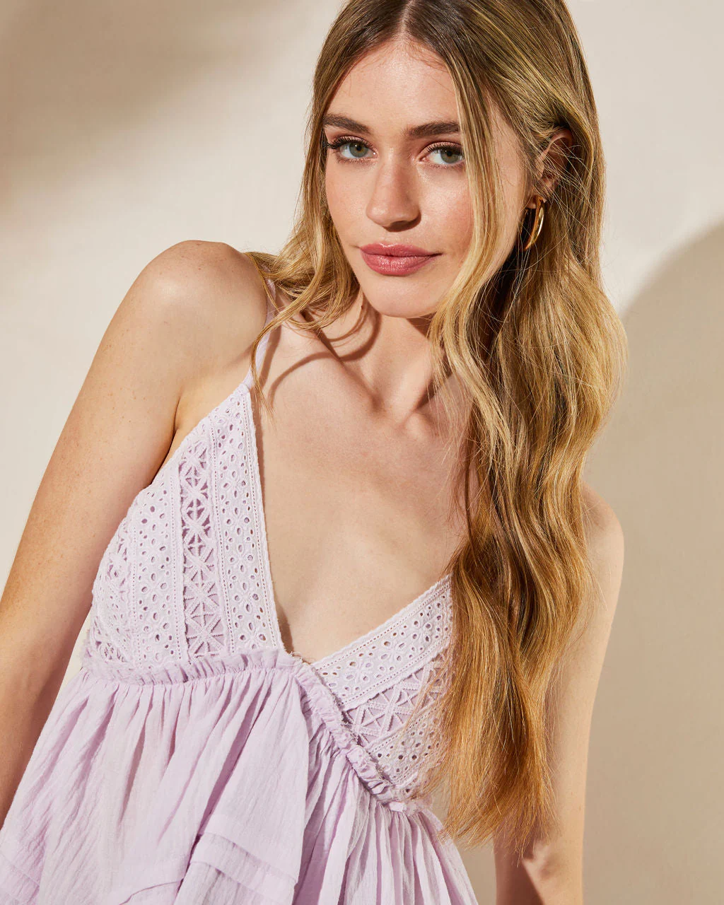 12393-cordo-eyelet-ruffle-hem-top-1.webp