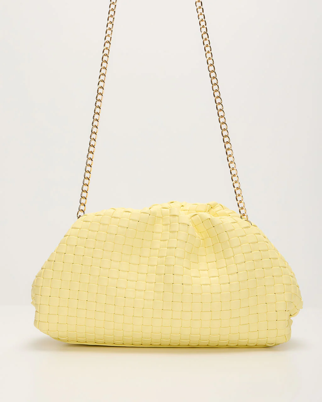 Janice Woven Leather Pouch Clutch