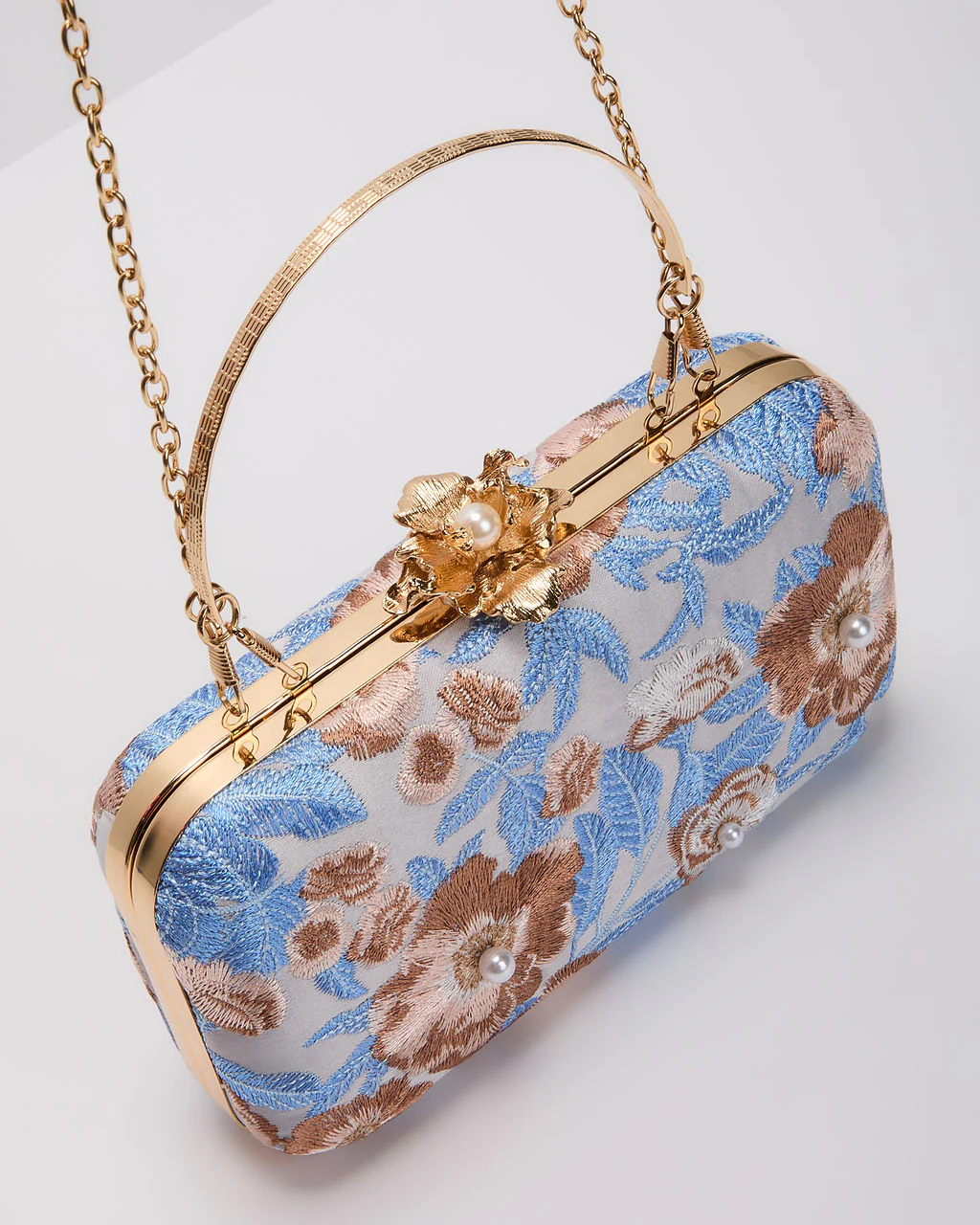 164-freesia-embroidered-hard-case-clutch-1.webp