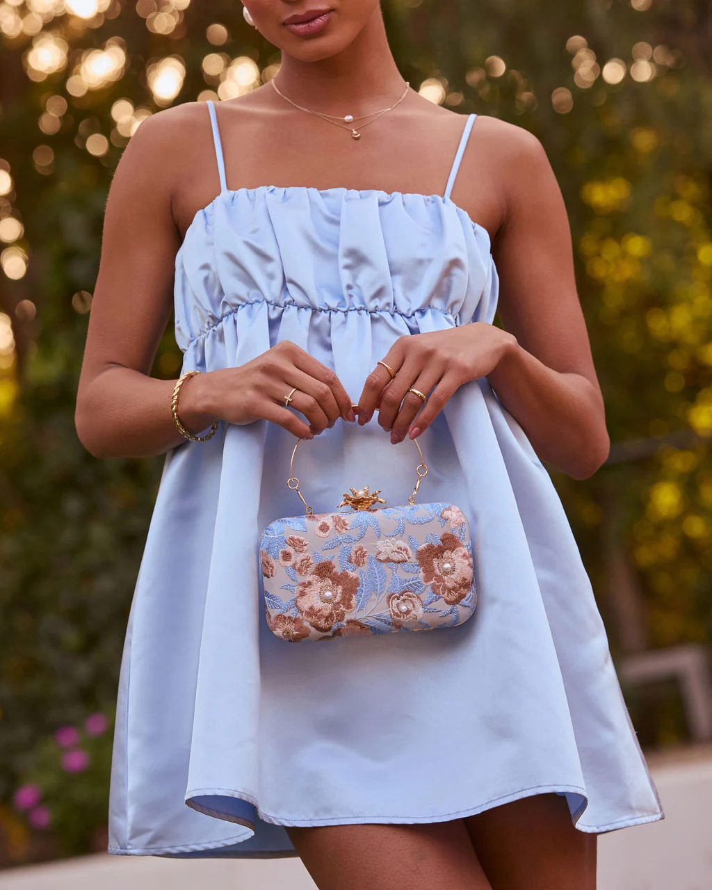 164-freesia-embroidered-hard-case-clutch-1.webp