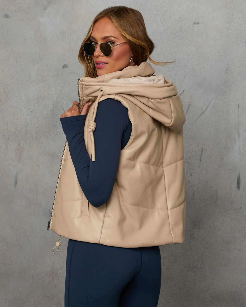 1727-shelton-pocketed-hooded-faux-leather-puffer-vest-1.webp
