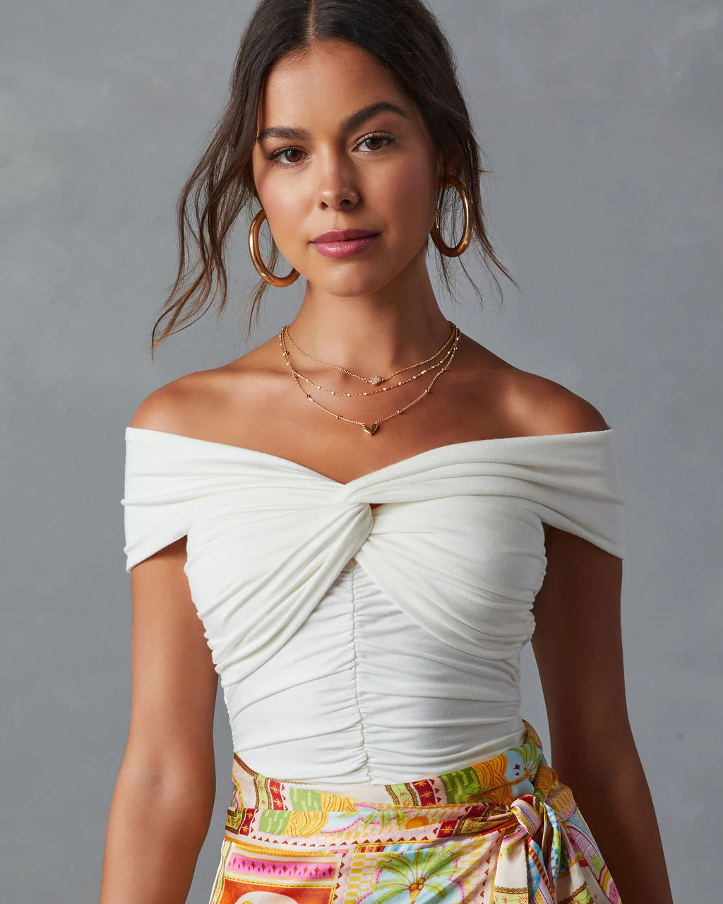 22058-trisha-off-the-shoulder-ruched-bodysuit-1.webp