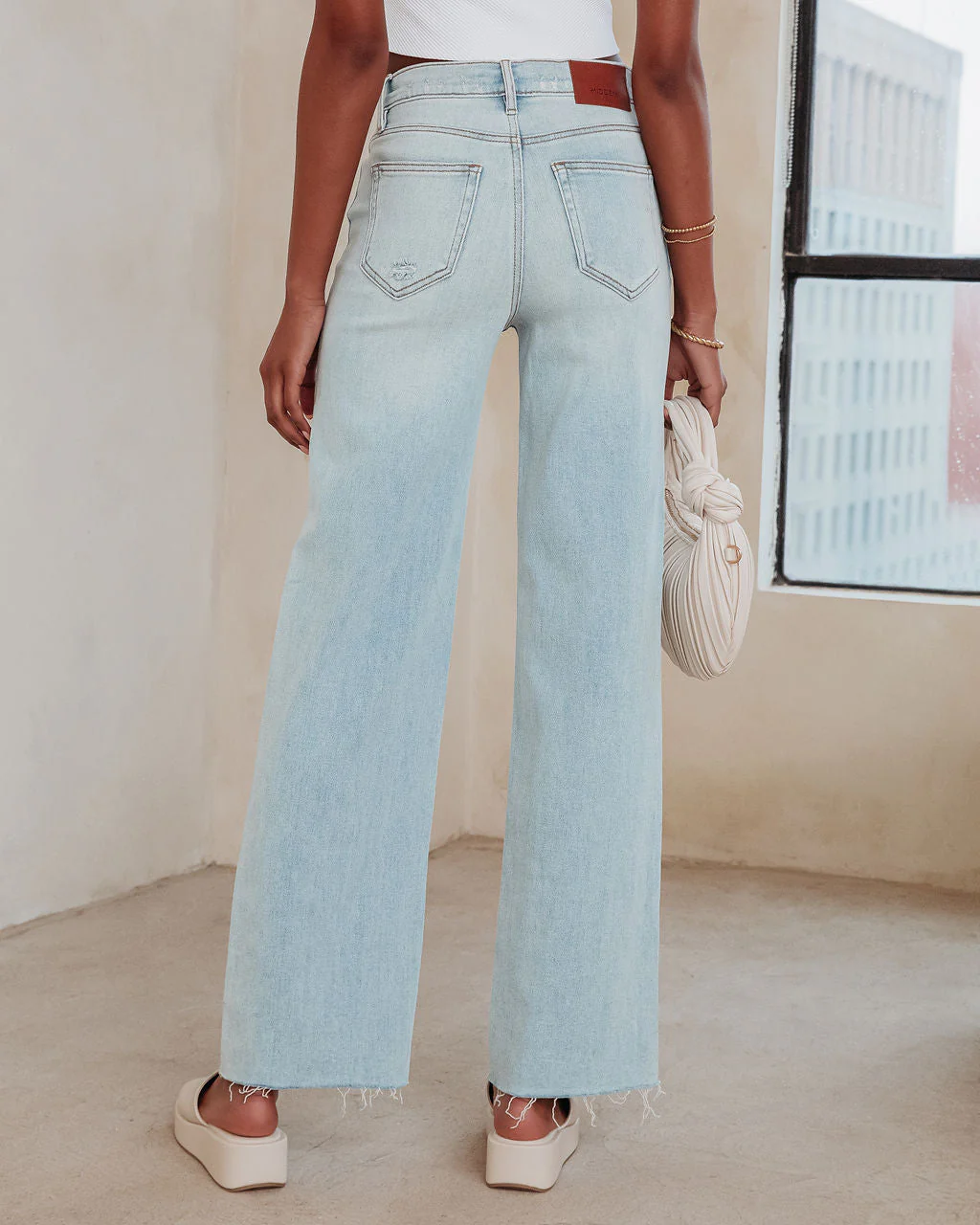 26566-logan-super-stretch-high-rise-relaxed-jeans-1.webp