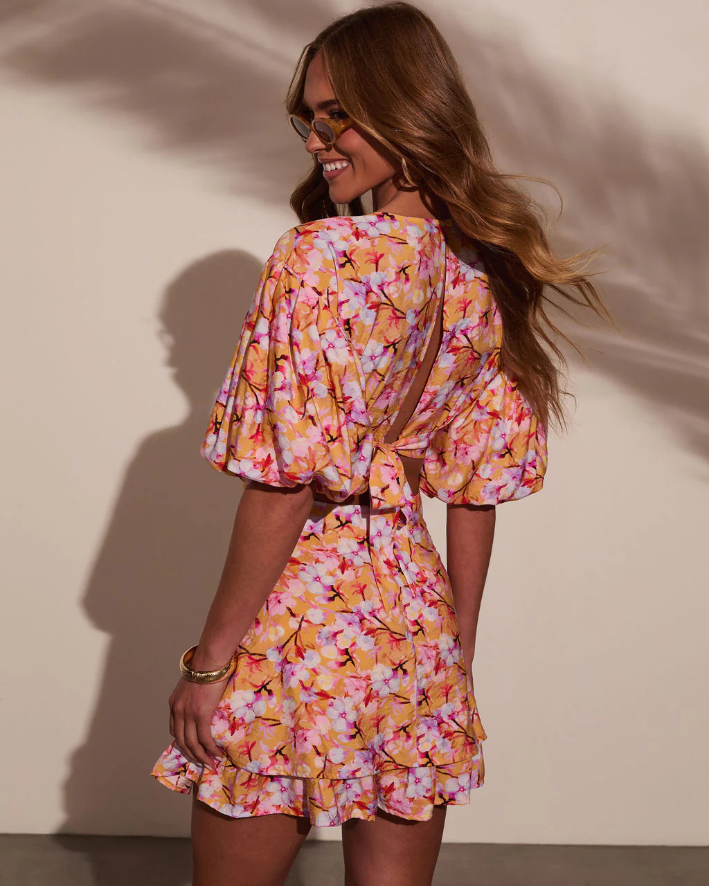 31925-nomadic-charm-floral-cut-out-mini-dress-1.webp