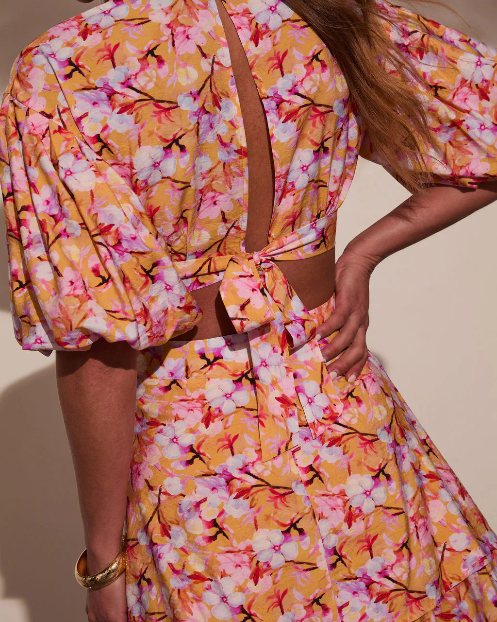 31925-nomadic-charm-floral-cut-out-mini-dress-1.webp