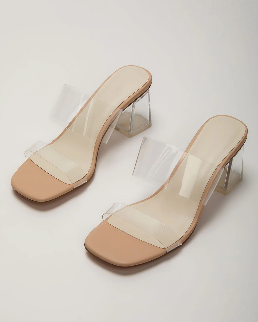 33046-savanna-clear-open-toe-mules-1.webp