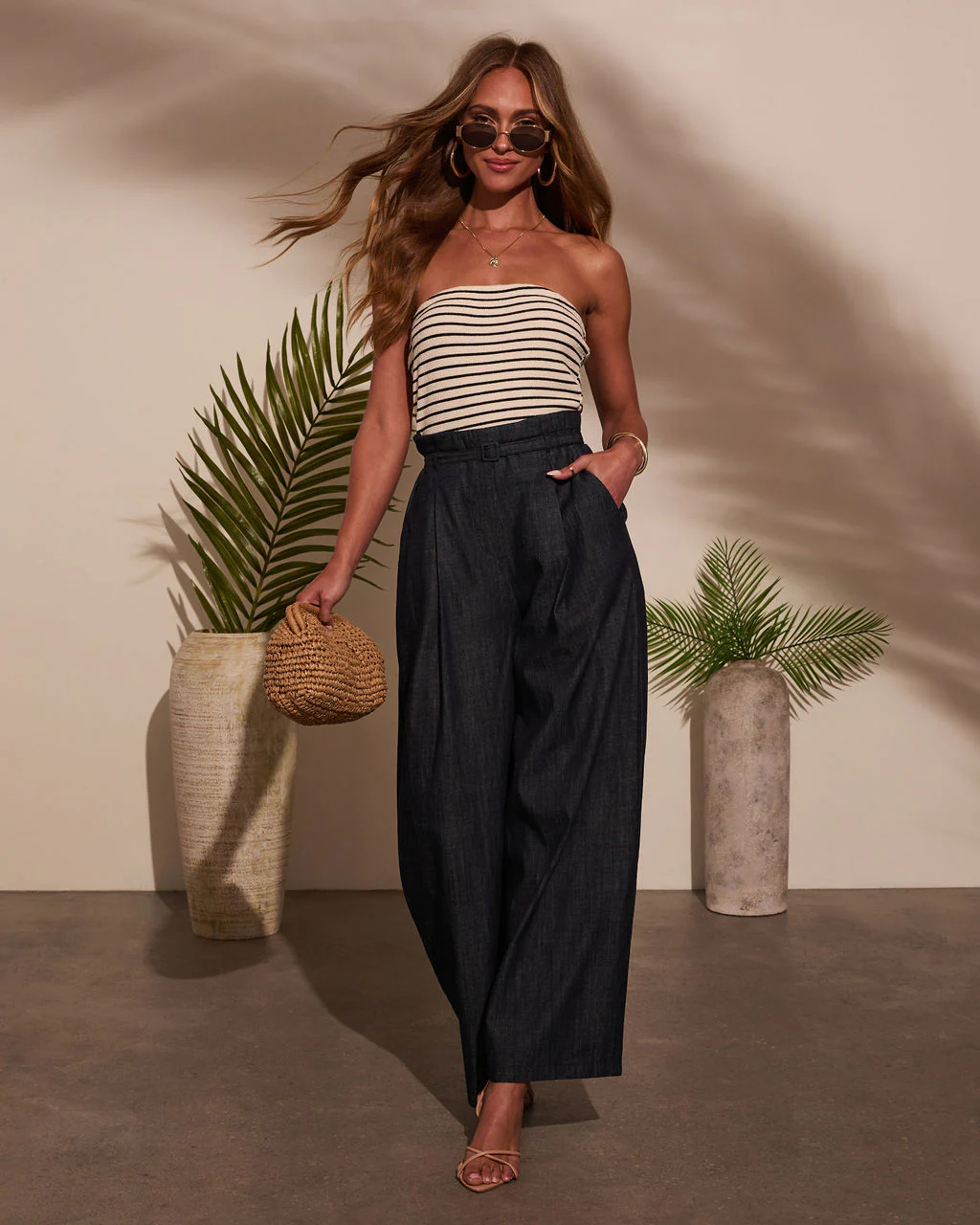 34130-jovanni-strapless-belted-jumpsuit-1.webp