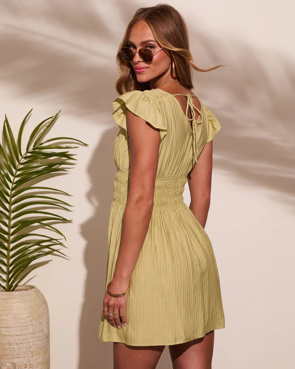 35263-whispers-of-summer-flutter-sleeve-mini-dress-1.webp