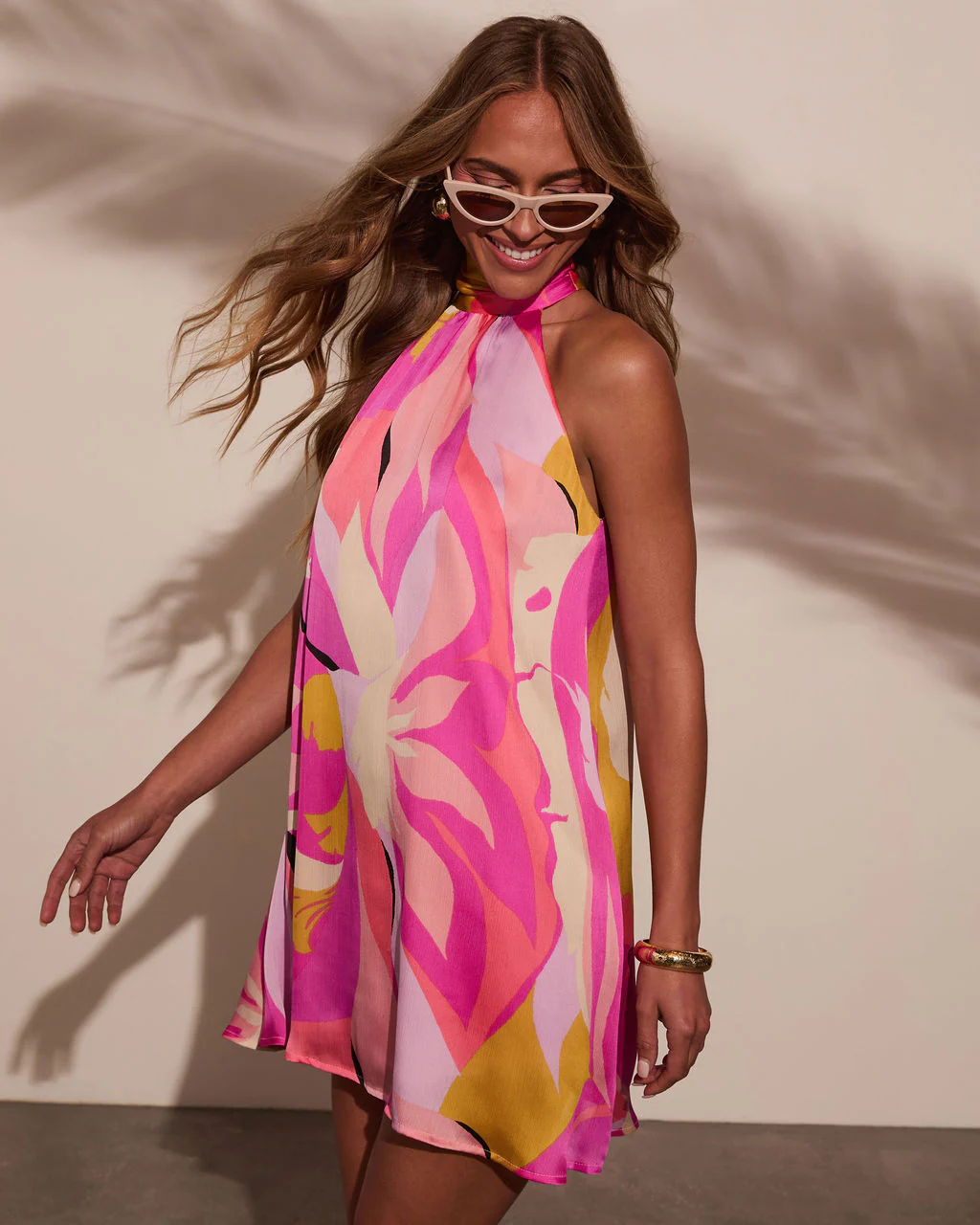 35489-tropical-treasure-floral-halter-mini-dress-1.webp