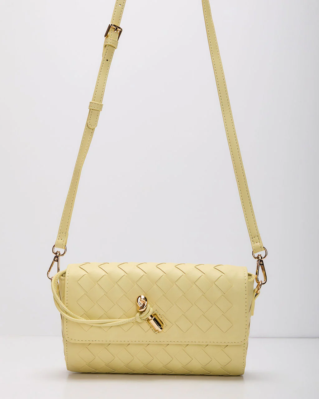 37220-nalani-woven-leather-crossbody-bag-1.webp