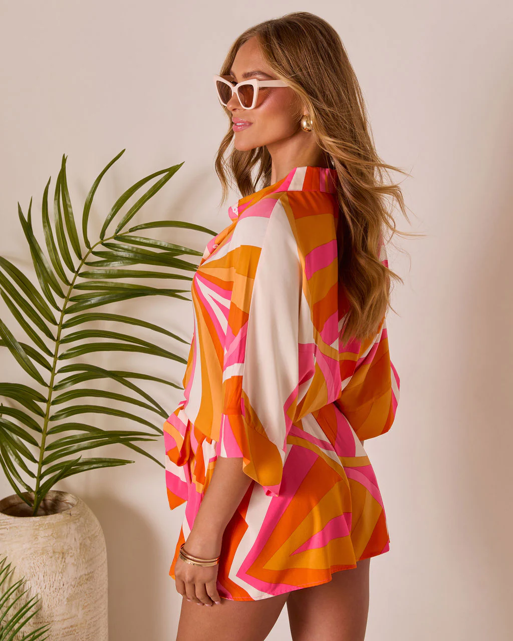 38324-glow-hour-waist-tie-romper-1.webp