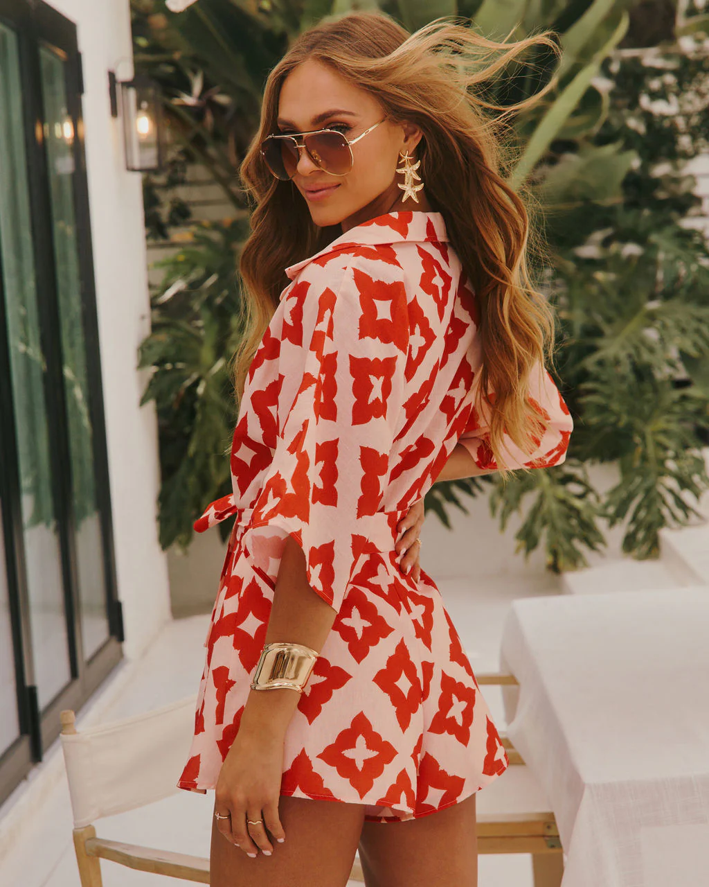 38453-santa-maria-abstract-waist-tie-romper-1.webp