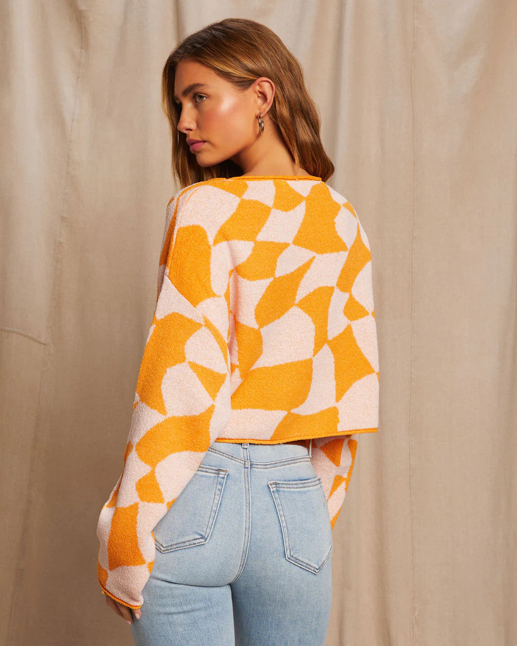 39356-rowyn-checkered-abstract-sweater-1.webp