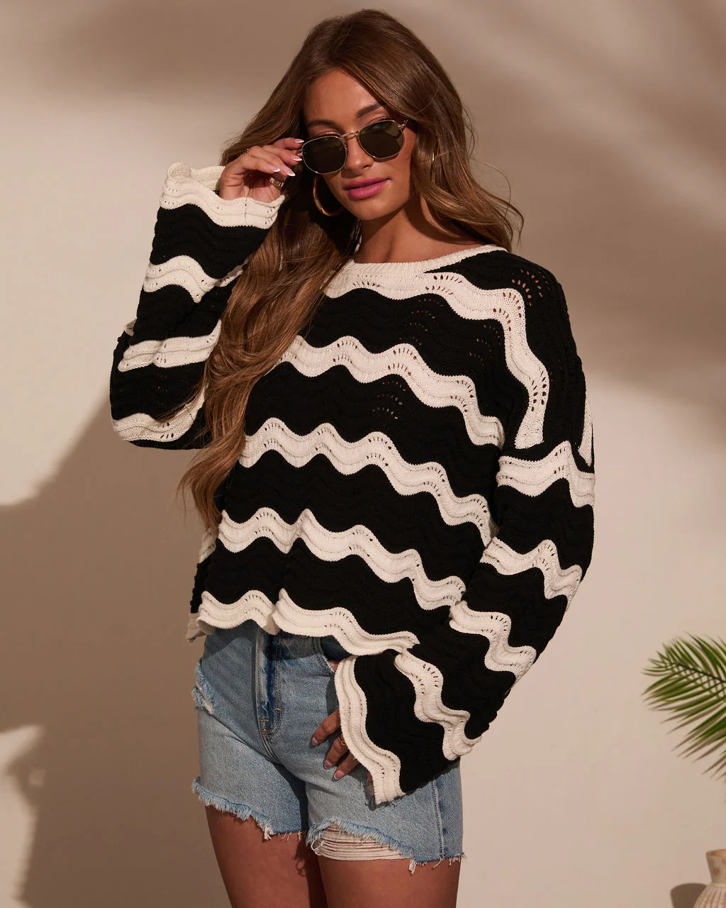 39396-janerio-wavy-striped-crochet-sweater-1.webp