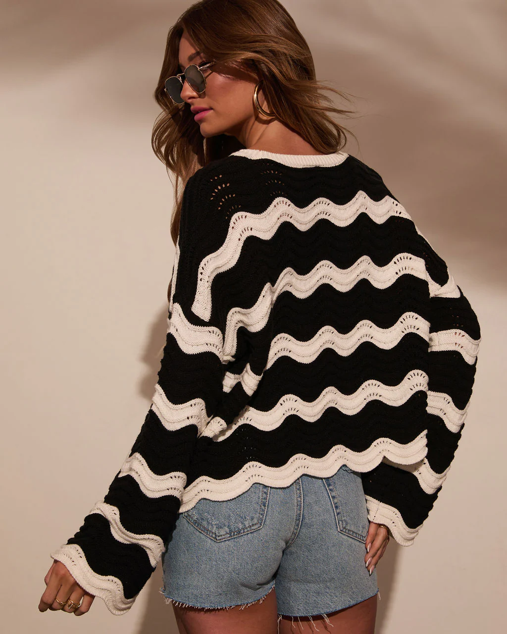 39396-janerio-wavy-striped-crochet-sweater-1.webp