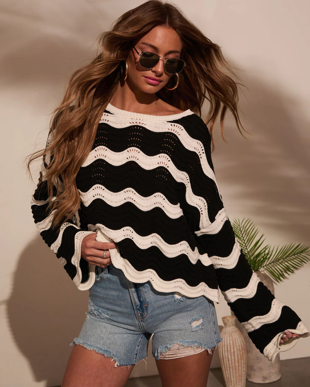 39396-janerio-wavy-striped-crochet-sweater-1.webp