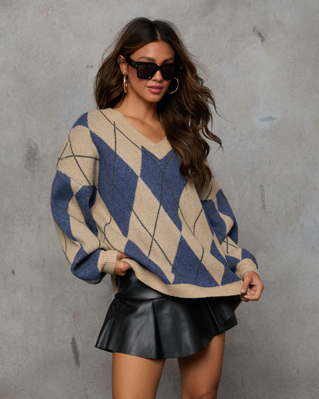 39490-remma-argyle-print-v-neck-sweater-1.webp