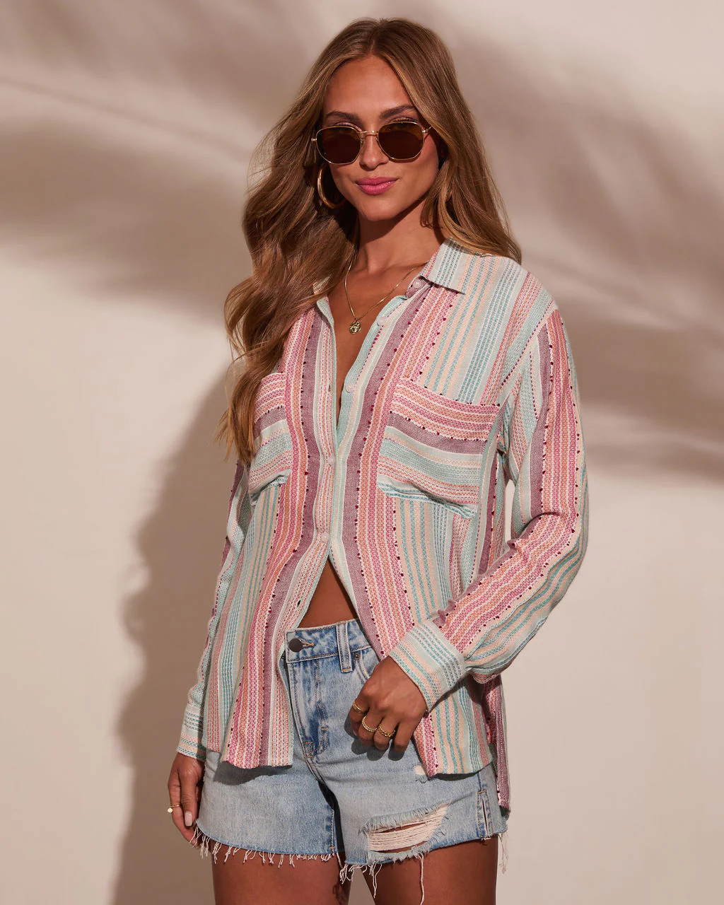 40142-larson-striped-button-down-top-1.webp
