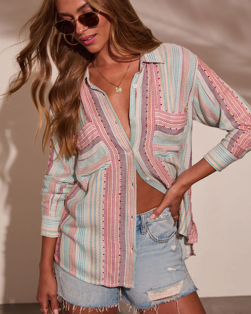 40142-larson-striped-button-down-top-1.webp