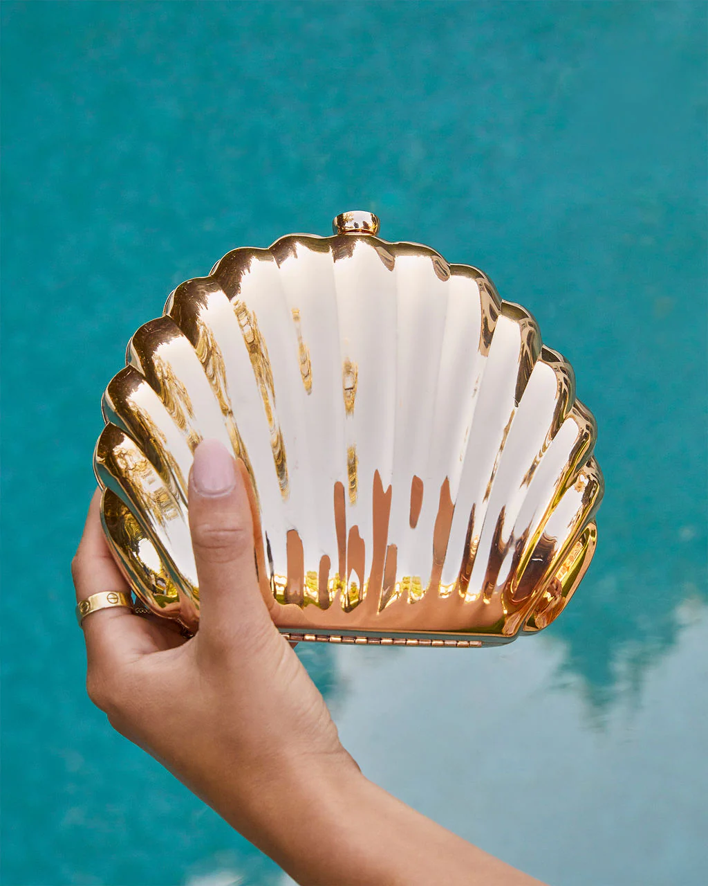 41890-gold-coast-shell-clutch-1.webp