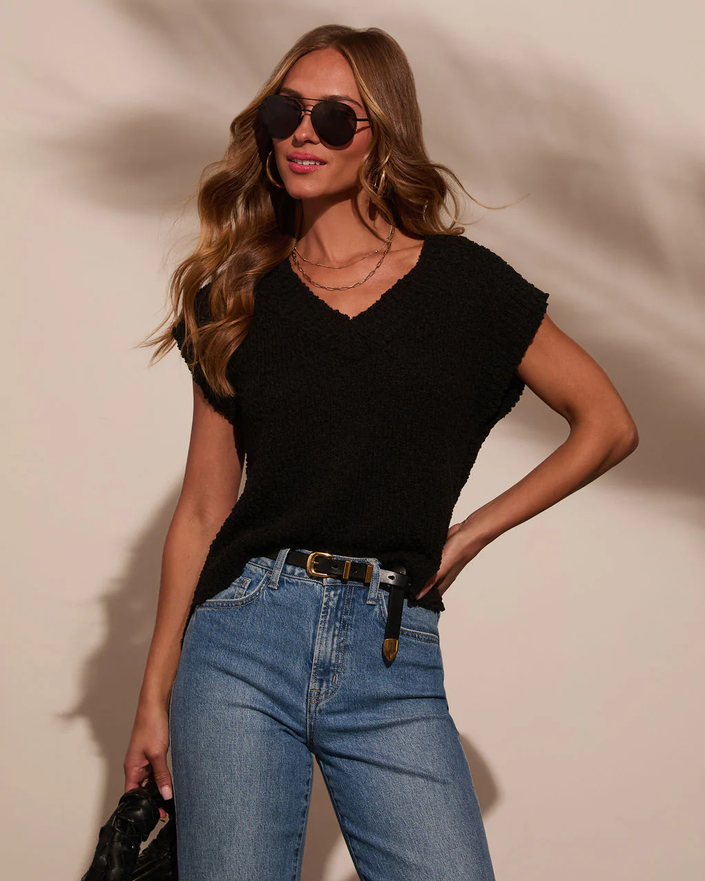 42875-kyana-sleeveless-sweater-1.webp