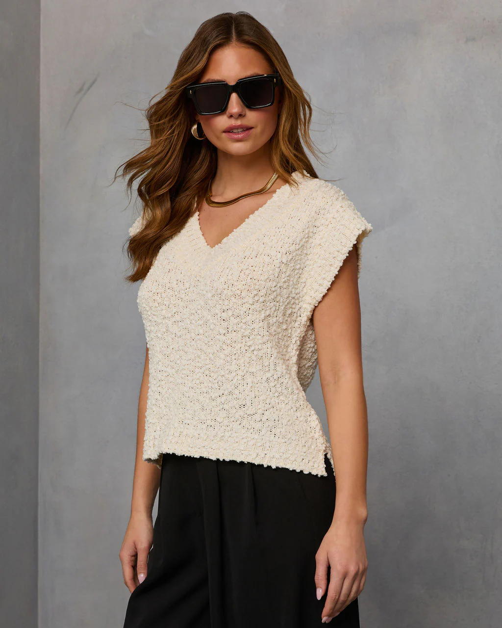 42875-kyana-sleeveless-sweater-1.webp