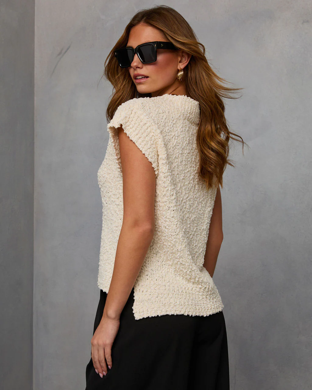 42875-kyana-sleeveless-sweater-1.webp