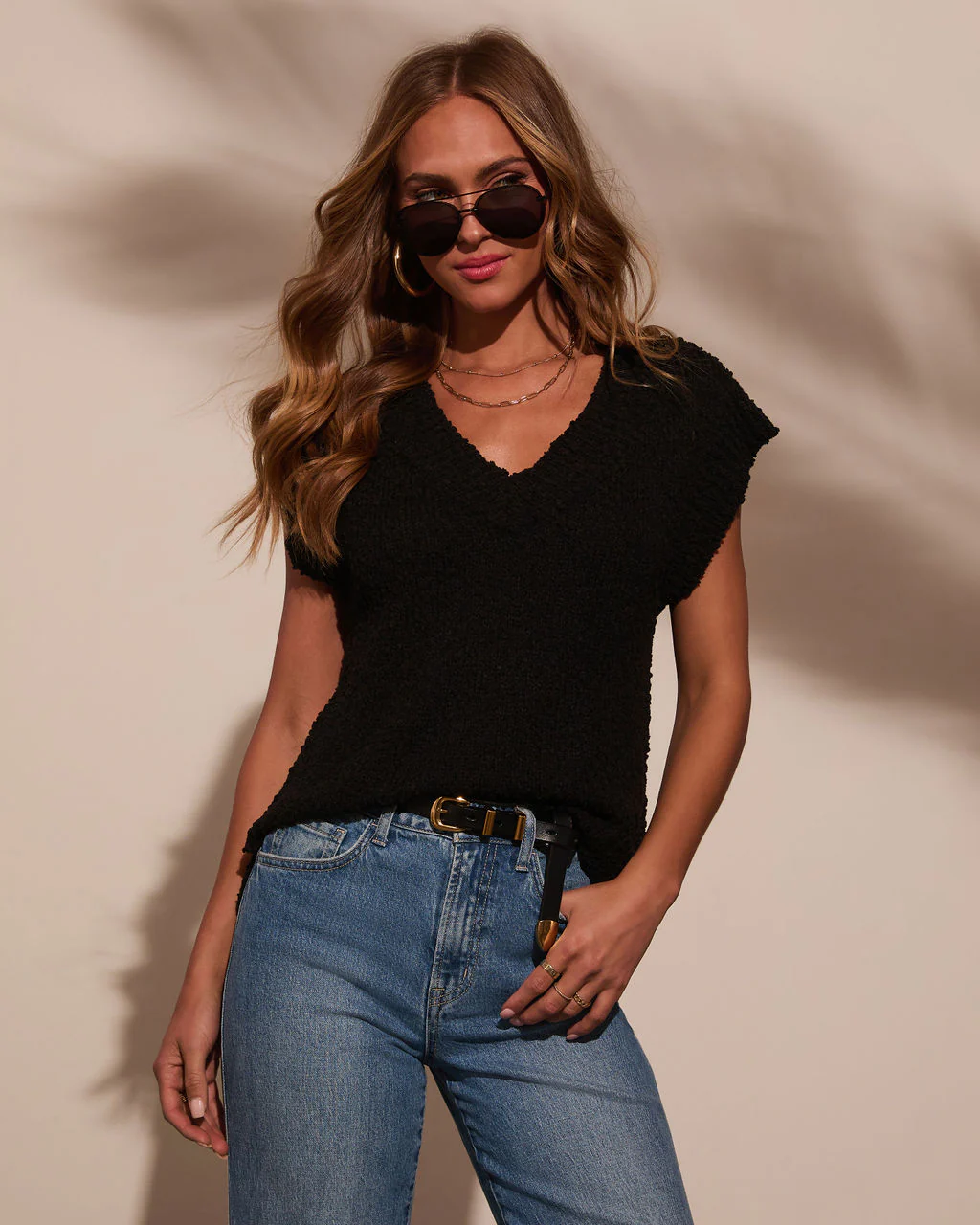 42875-kyana-sleeveless-sweater-1.webp