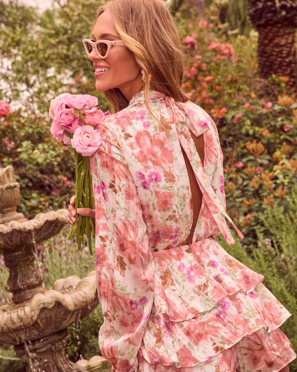 4581-garden-glee-ruffle-floral-romper-1.webp