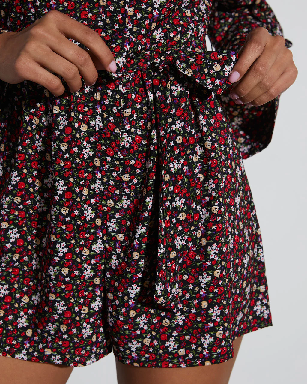 9420-angelina-printed-button-down-romper-1.webp